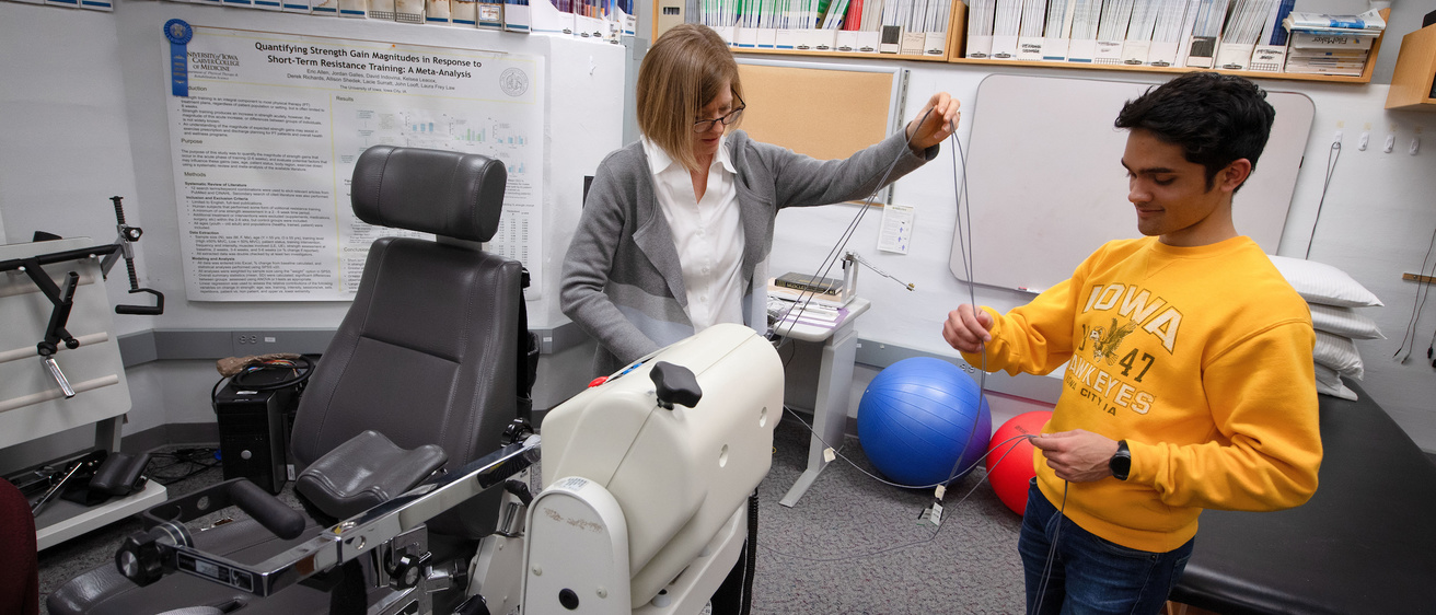 Dr. Laura Law with student